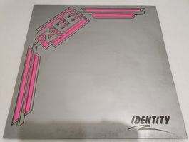Zee – Identity