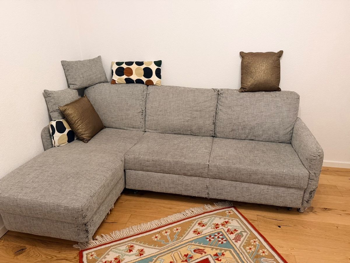 Divani: Ecksofa grau mit Schlaffunktion gebrauchter Zustand – Usato da Schwerzenbach venduto da Alio