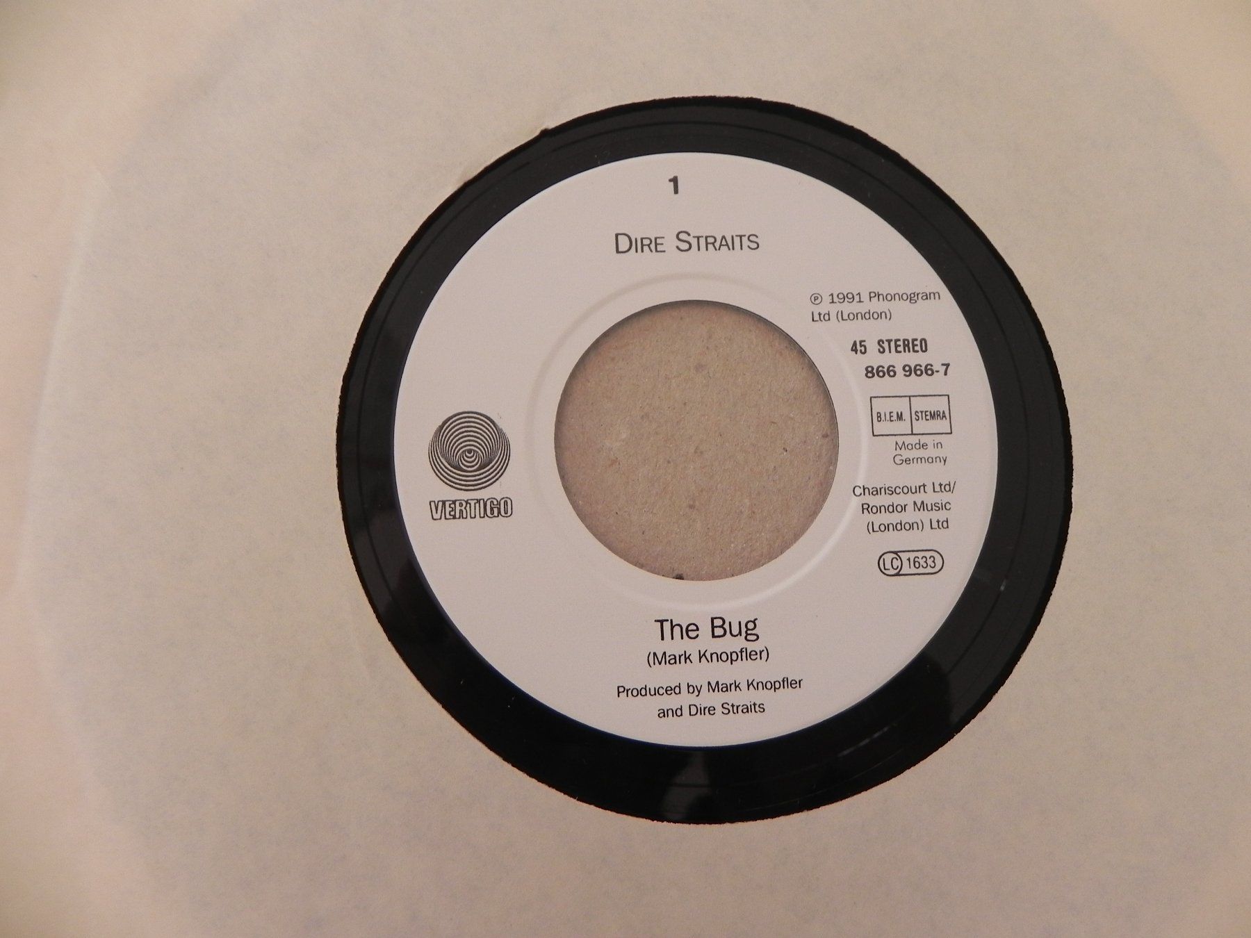 Dischi in vinile: Single brit. Rock Band Dire Straits 1992 The Bug / Twisting – Usato da Siebnen venduto da krimsie 2