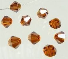 10 Perlen bicone     6mm     topas