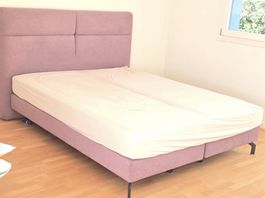 Lilac Upholstered Bed Frame with Headboard and mattress.