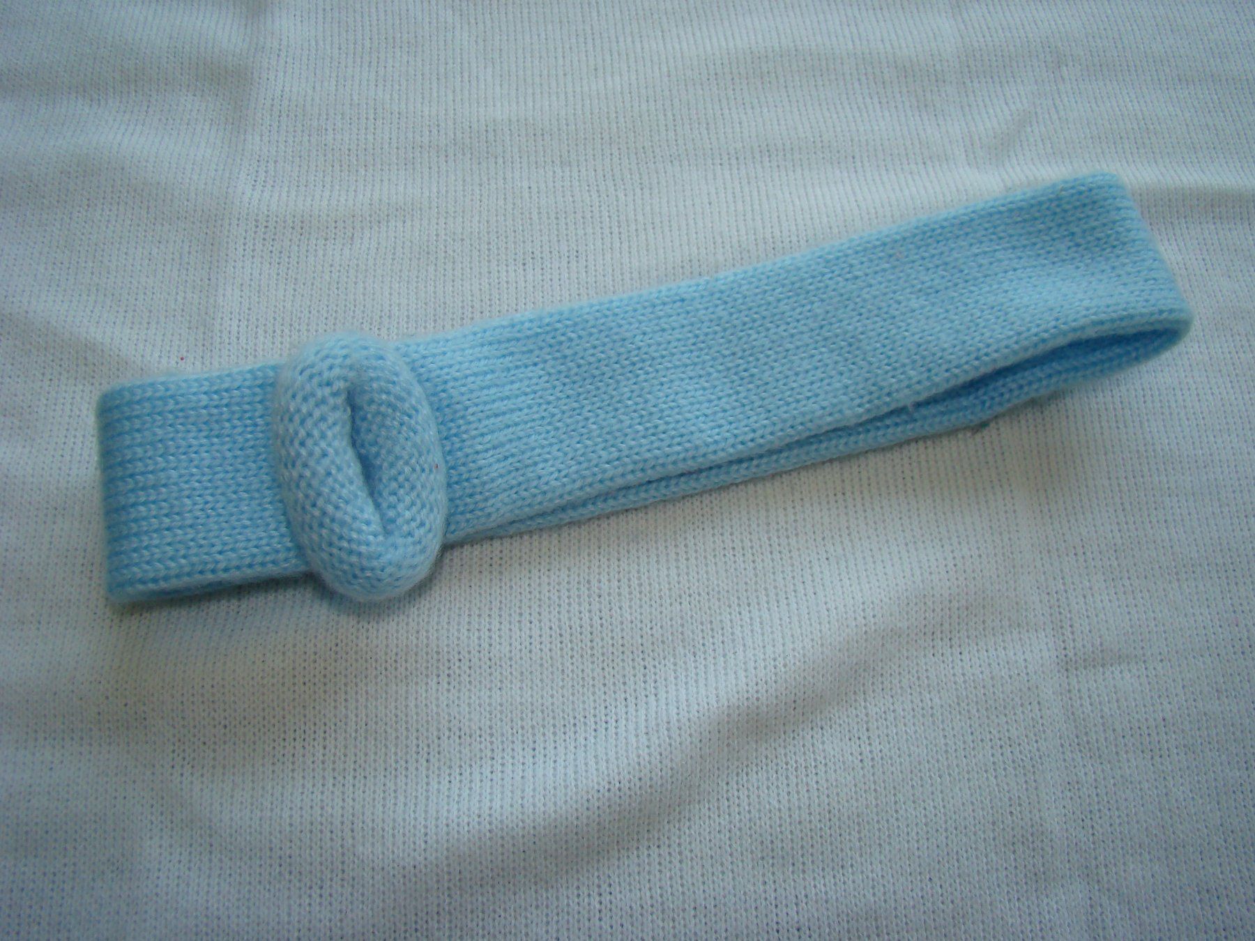 Copricapi, berretti & cappellini: Stirnband hellblau gestrickte Optik – Usato da Malters venduto da burzi