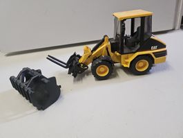 Bruder: Bagger CAT mit Schaufel und Gabel