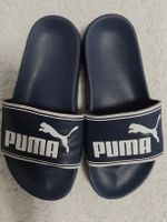 Puma Badeschuhe dunkelblau mit Puma Logo in weiss Grösse 36