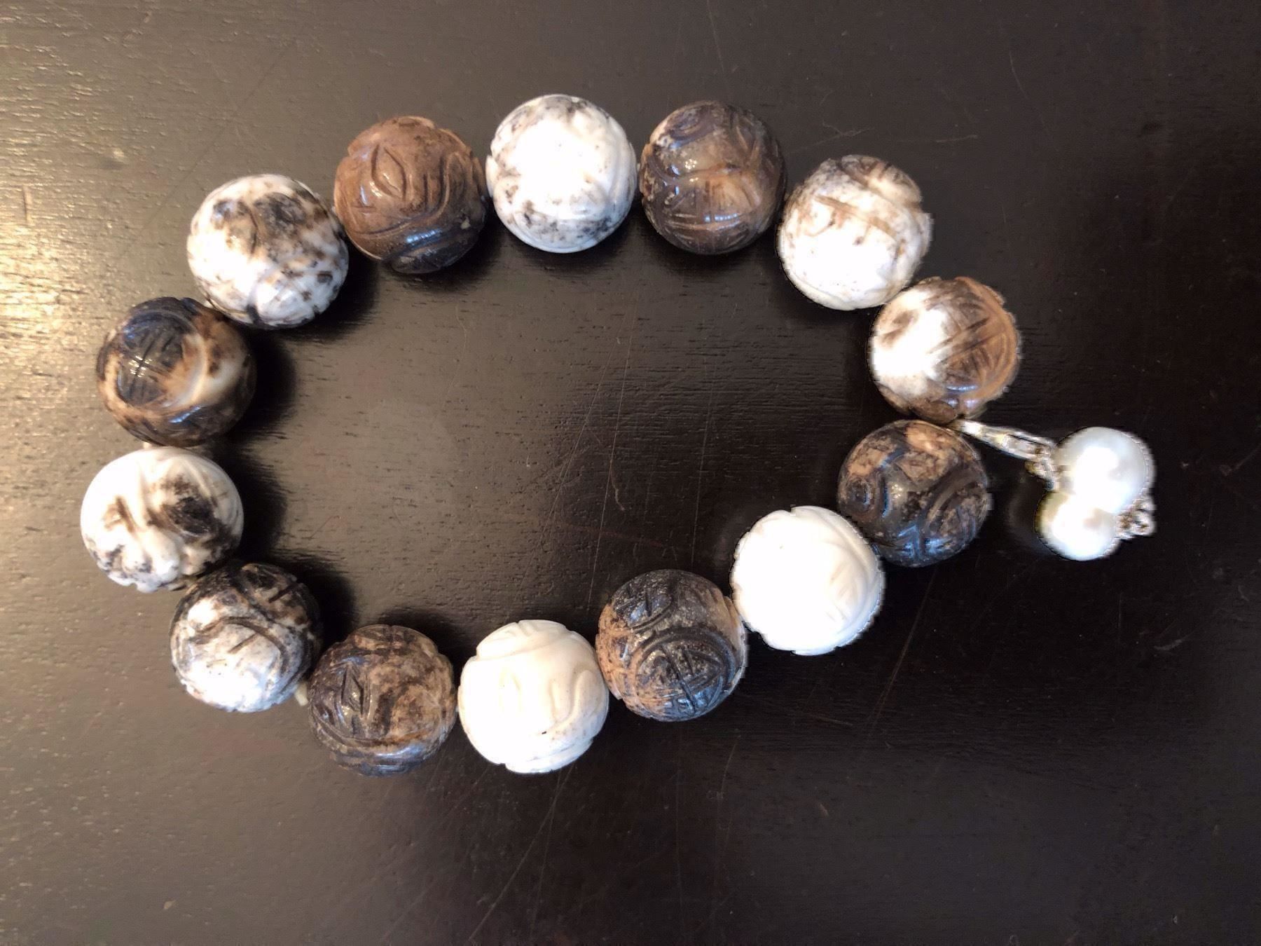 Bracciali & Braccialetti: SPEZIELLES ARMBAND MARMORISIERT, PERLE – Usato da Meggen venduto da Meggeni