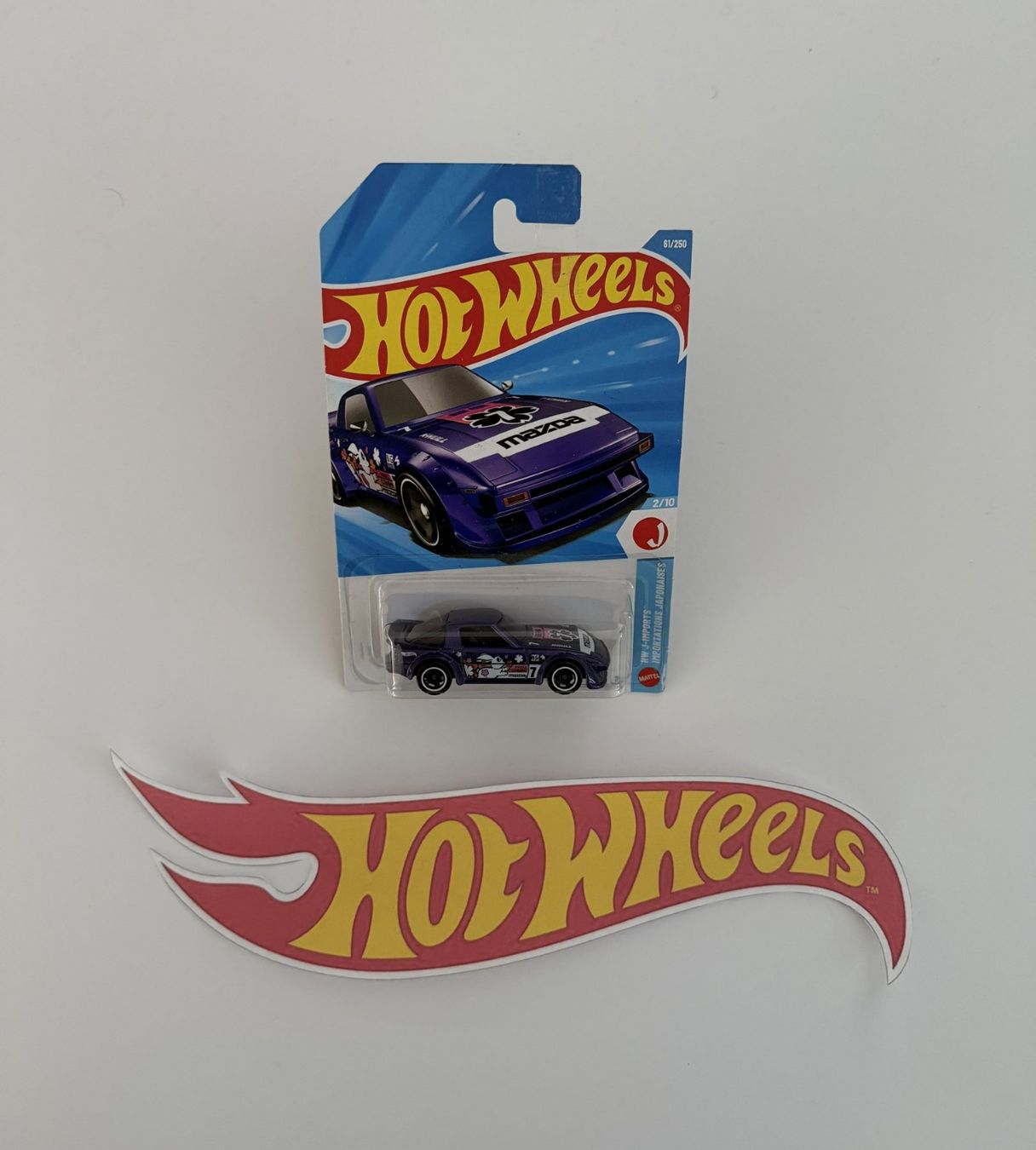 Hot Wheels Modellini d'auto: Hot Wheels Mazda RX-7 Long Card – Nuovo e nell'imballaggio originale da Luzern venduto da qui_25zt