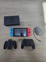 Nintendo Switch (V1) inkl. Zubehör & Wandhalterung 