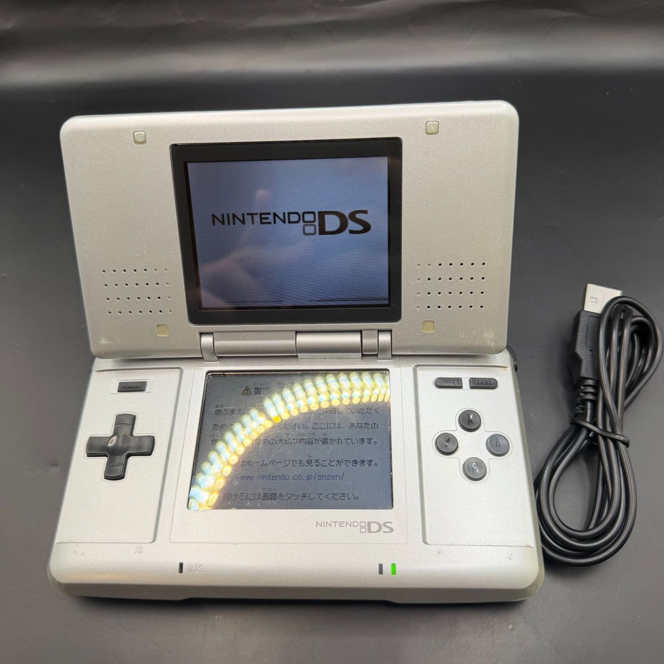 Nintendo Konsolen: Nintendo DS Silber Japan-Version – Defekt aus Düdingen von Nerdworld