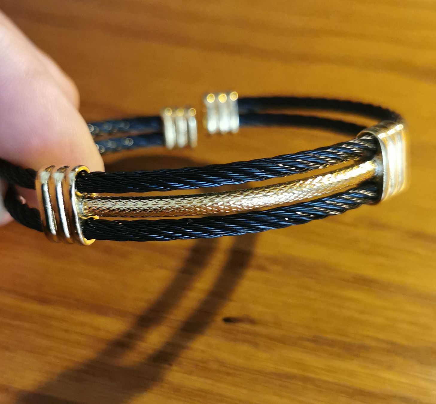 Bracciali & Braccialetti: Bracelet Acier noir & placage doré type Albanu – Nuovo e nell'imballaggio originale da Geneve venduto da Vtss00