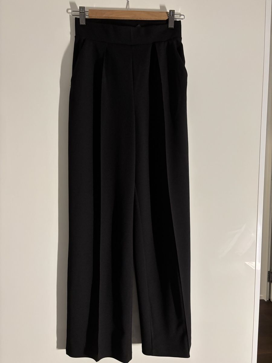 H&M Pantaloni: H&M Black wide trousers – Usato da Wollerau venduto da Dolder23