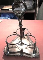 Ancien porte-bouteille en métal argenté
