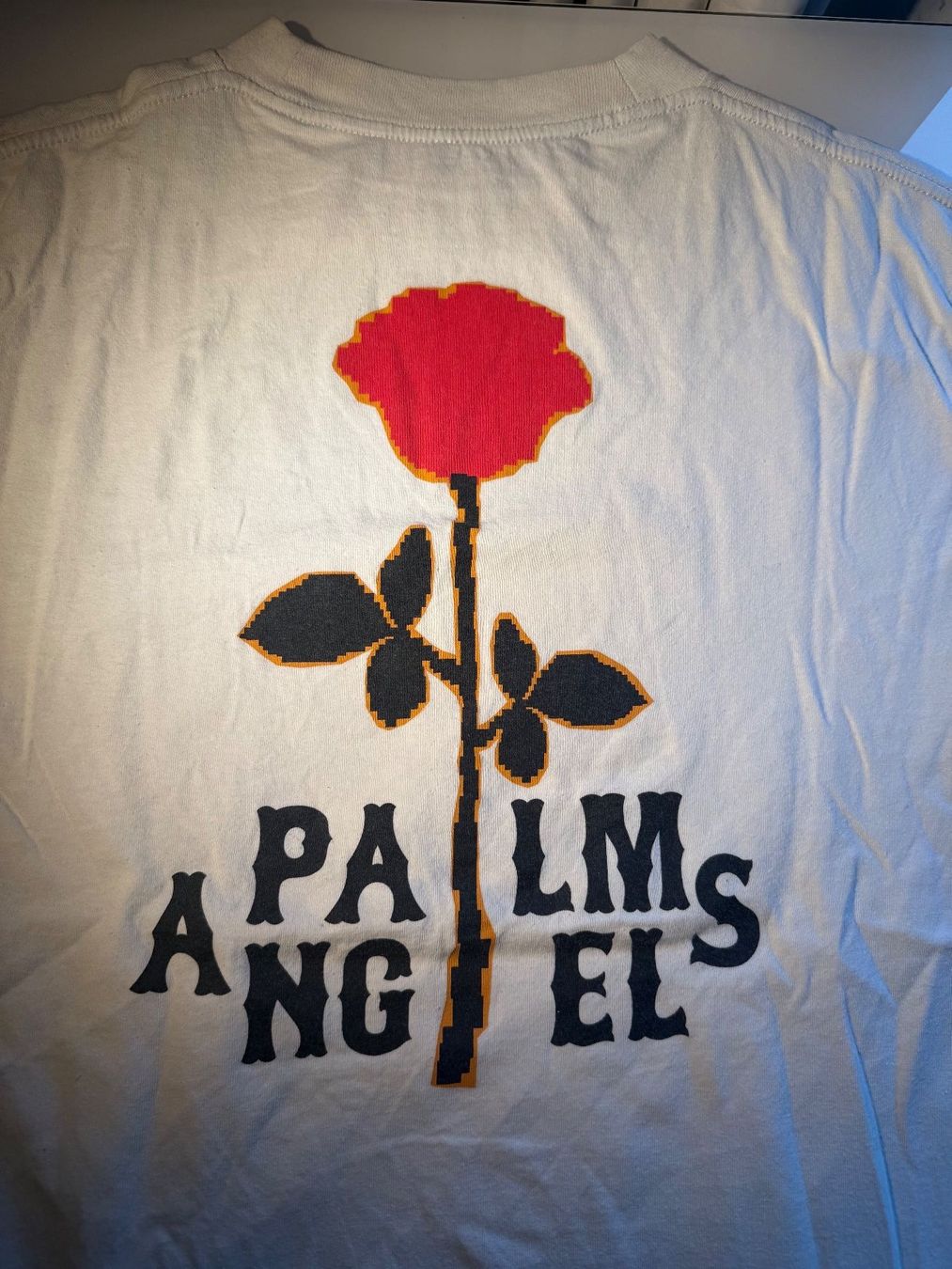 Palm Angels T-shirt: Palm Angels rose tee – Usato da Freienbach venduto da casciatoalessandro 1
