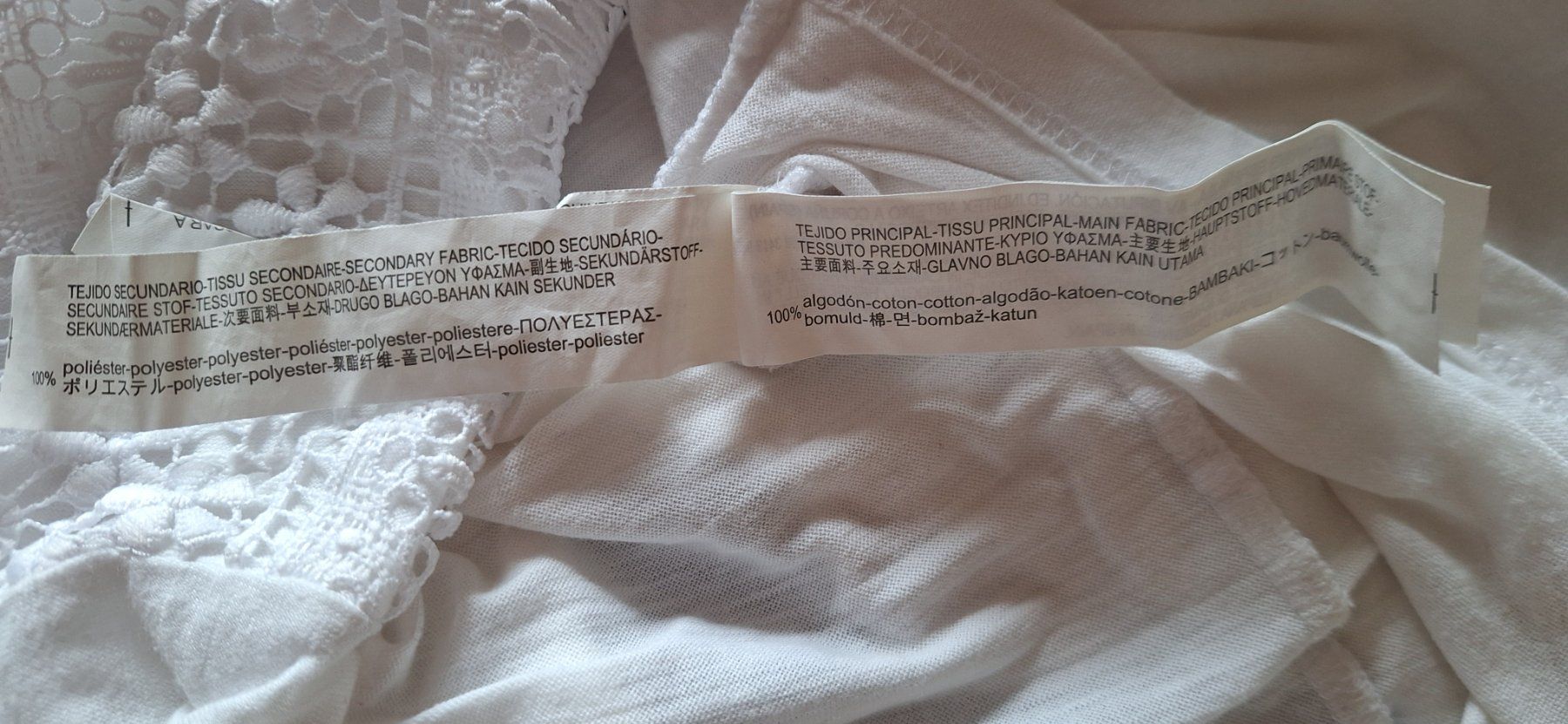 Stradivarius Top: Stradivarius, top blanc (dentelle) – Nuovo (secondo la descrizione) da Lussery-Villars venduto da pousinete02 4