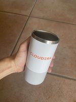 Weisser Thermobecher Thermotasse mit Cloudera Logo
