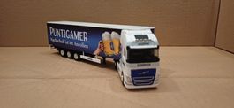 HERPA. VOLVO FH 4X2. REMORQUE.3 AXES.  PUNTIGAMER.