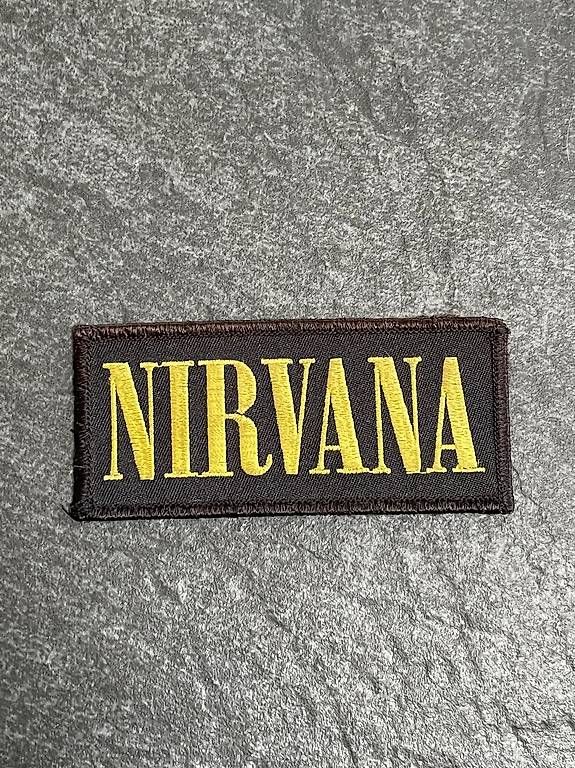 Toppe: Nirvana Patch  schwarz mit gelbem Logo – Nuovo (secondo la descrizione) da Schafhausen i.E. venduto da prodigy21
