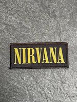Nirvana Patch  schwarz mit gelbem Logo