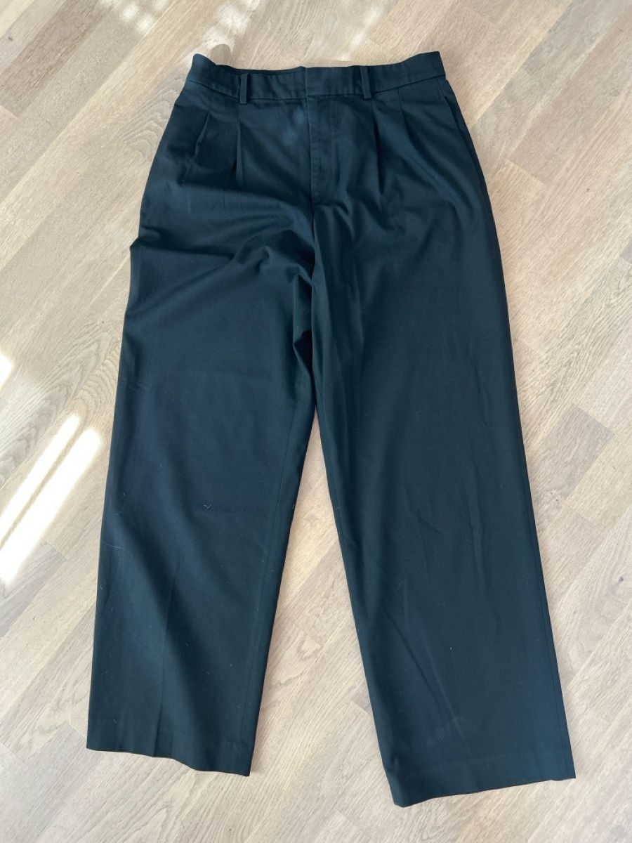 Uniqlo Pantalons: Schwarze Schlaghose M – D'occasion à Adlikon b. Regensdorf par Huegeler