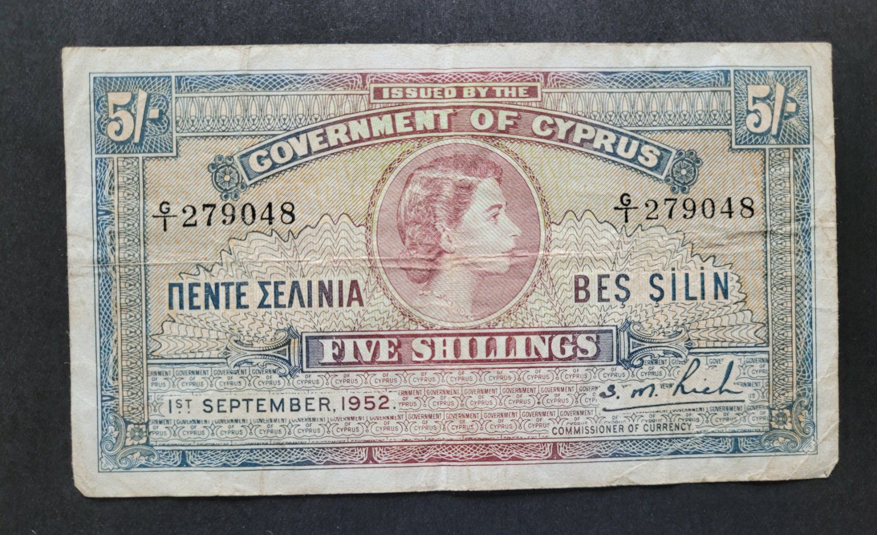 Banconote: Geldnote Five Shillings von Zypern 1952 – Usato da Schaffhausen venduto da robuco