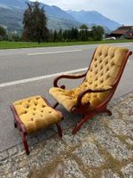 Sessel mit Hocker