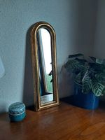 Miroir élégant doré sur bois massif