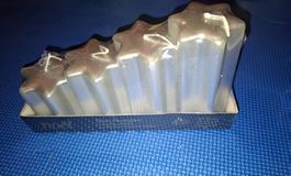 Lot de 4 bougies étoiles argentées neuves/Set mit 4 silberne