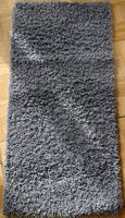 Tapis à poils longs gris