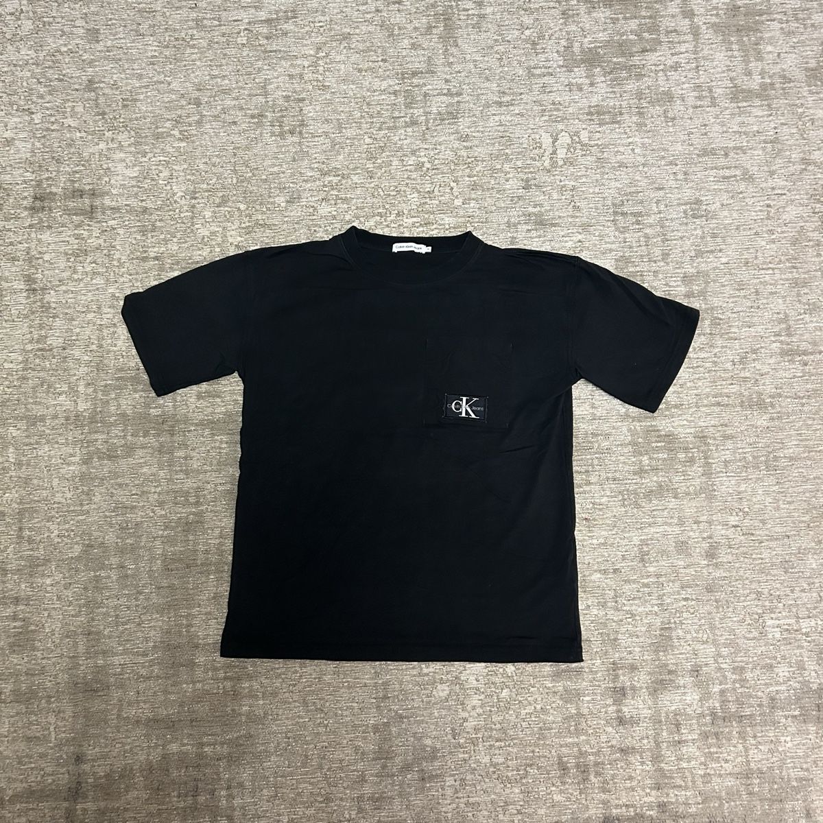 Calvin Klein Camicie, T-shirt & Polo: T-shirt Calvin Klein noir, taille 14 – Nuovo (secondo la descrizione) da St-George venduto da elena27