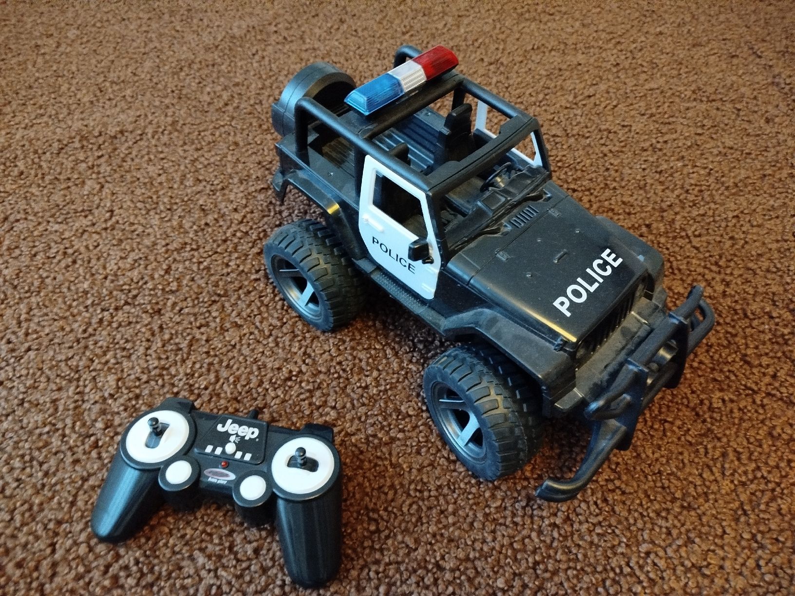 Spielzeuge: Polizei Jeep, ferngesteuert. Top Zustand – Gebraucht aus Naters von oks_6rfv
