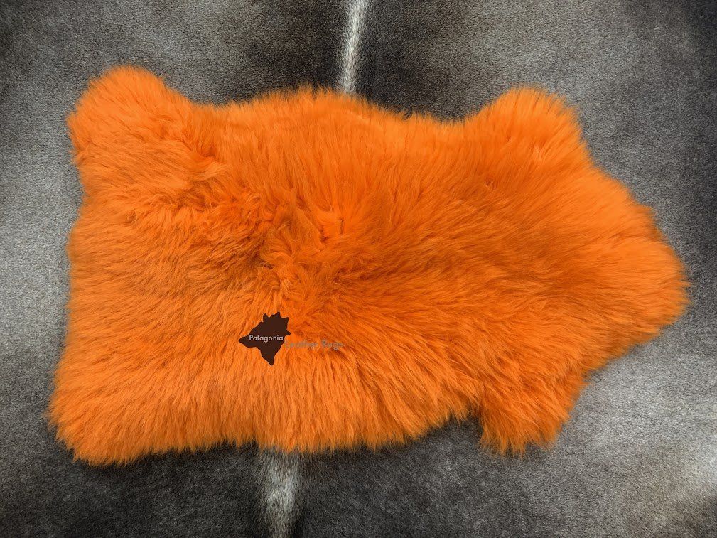 Tappeti: Lammfell Teppich Orange – Nuovo e nell'imballaggio originale da Arbedo venduto da patagonialeatherrugs 1