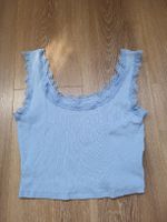 Top en dentelle bleu clair taille M bon état