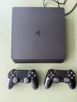 PlayStation 4 Slim – 1 To – Noir + 2 manettes