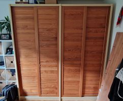 Wooden Wardrobe with Sliding Slatted Doors