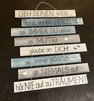 Holzschild mit Spruch