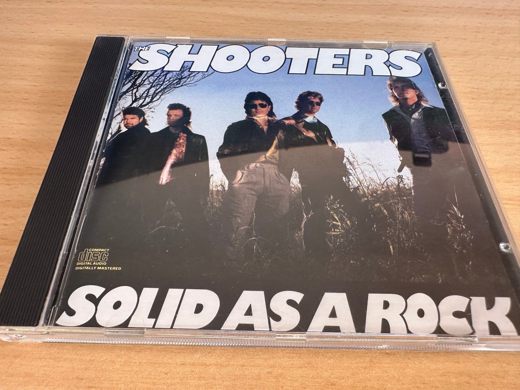 CD: The Shooters – Solid As A Rock – Usato da Rikon im Tösstal venduto da Alpenmutz