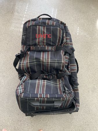 Dakine Reisetasche mit Rollen kariert schwarz gebraucht