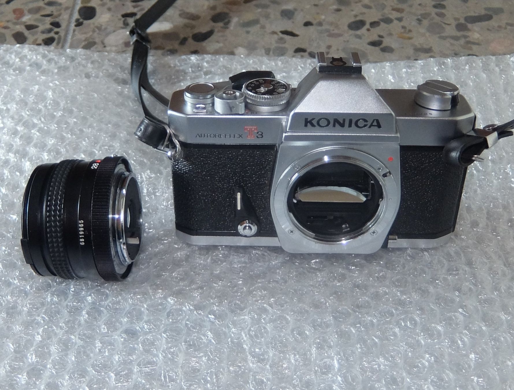 Konica Fotocamera: Konica Autoreflex T3 Kamera mit Objektiv und Blitz – Usato da Basel venduto da Elektronik_Markt 6