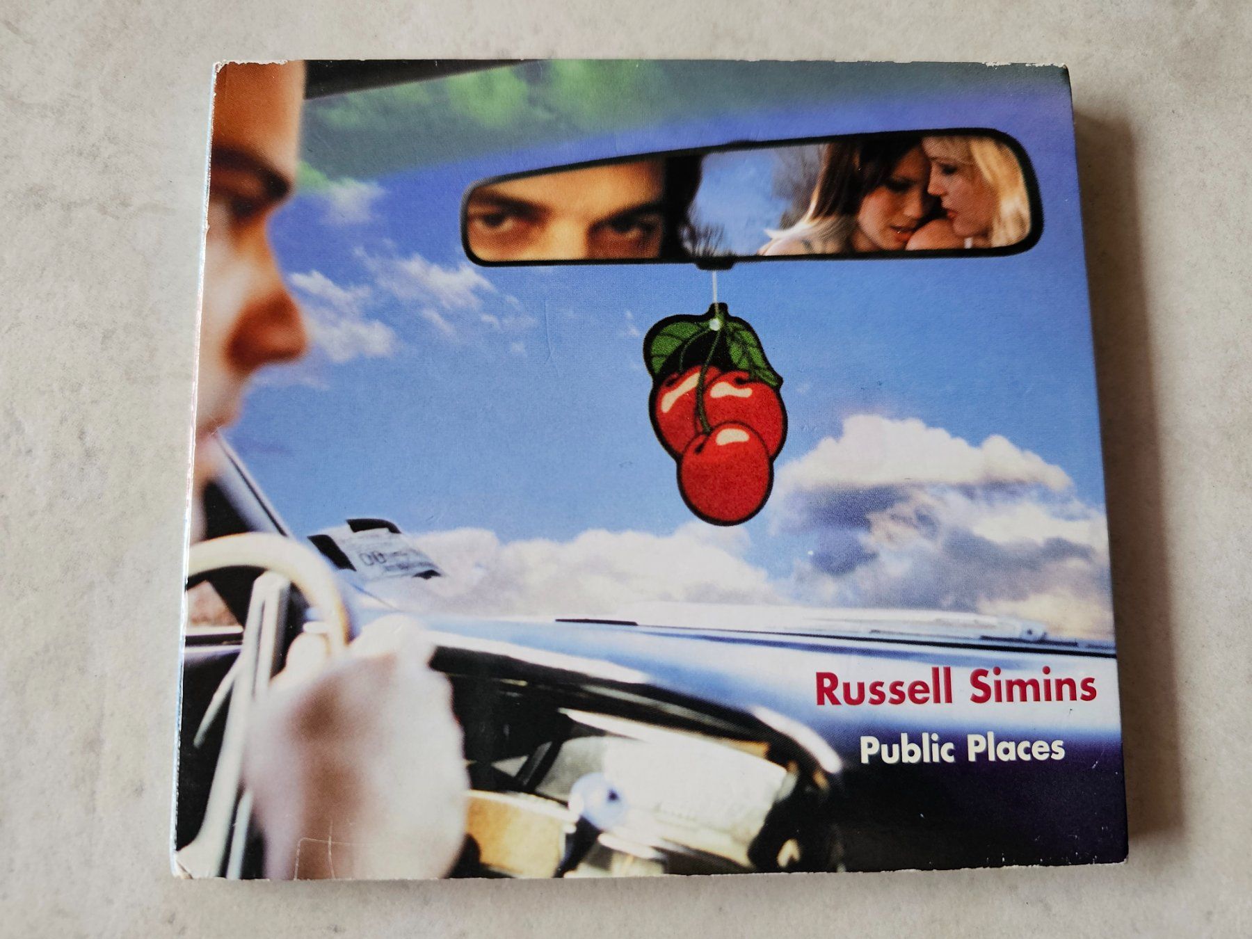 CD: Russell Simins  -  Public Places – Usato da Schneisingen venduto da backstore24