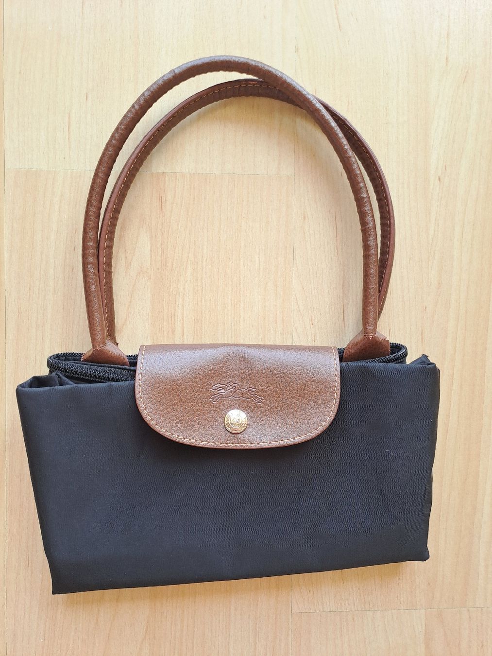 Taschen für Damen: Sac à main de type Longchamp Pliage Noir – Defekt aus Denens von Chanchantevend 1