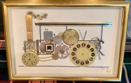 QUADRO CON COLLAGE DI PARTI DI VECCHI OROLOGI. VINTAGE