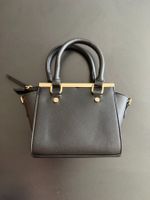 Mini sac noir élégant avec bandoulière *