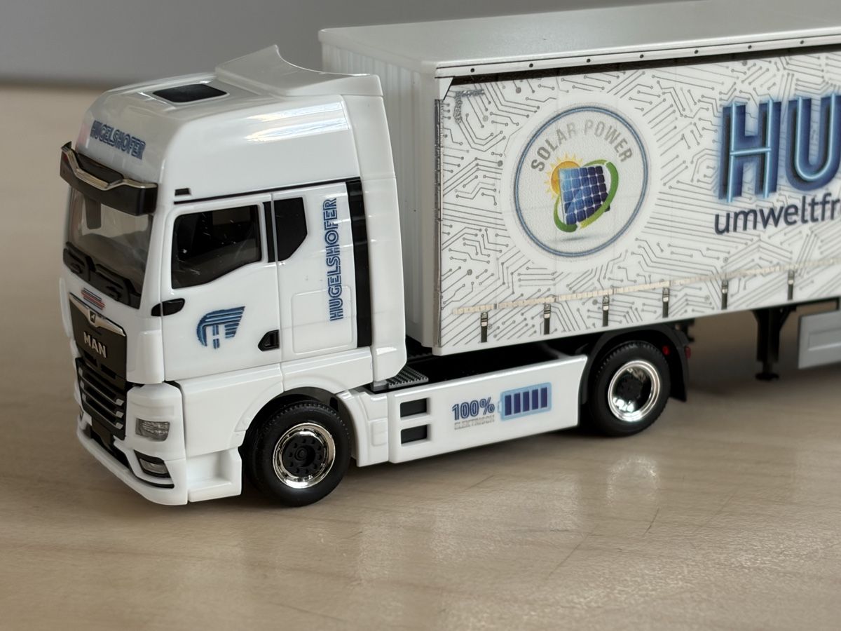 Herpa Modellini d'auto: MAN TGX GX ELECTRIC Hugelshofer – Nuovo e nell'imballaggio originale da Felben-Wellhausen venduto da Mobil01 2