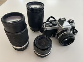 Nikon FE inkl. Nikkor Normal, Weitwinkel und Zoom-Objektiven