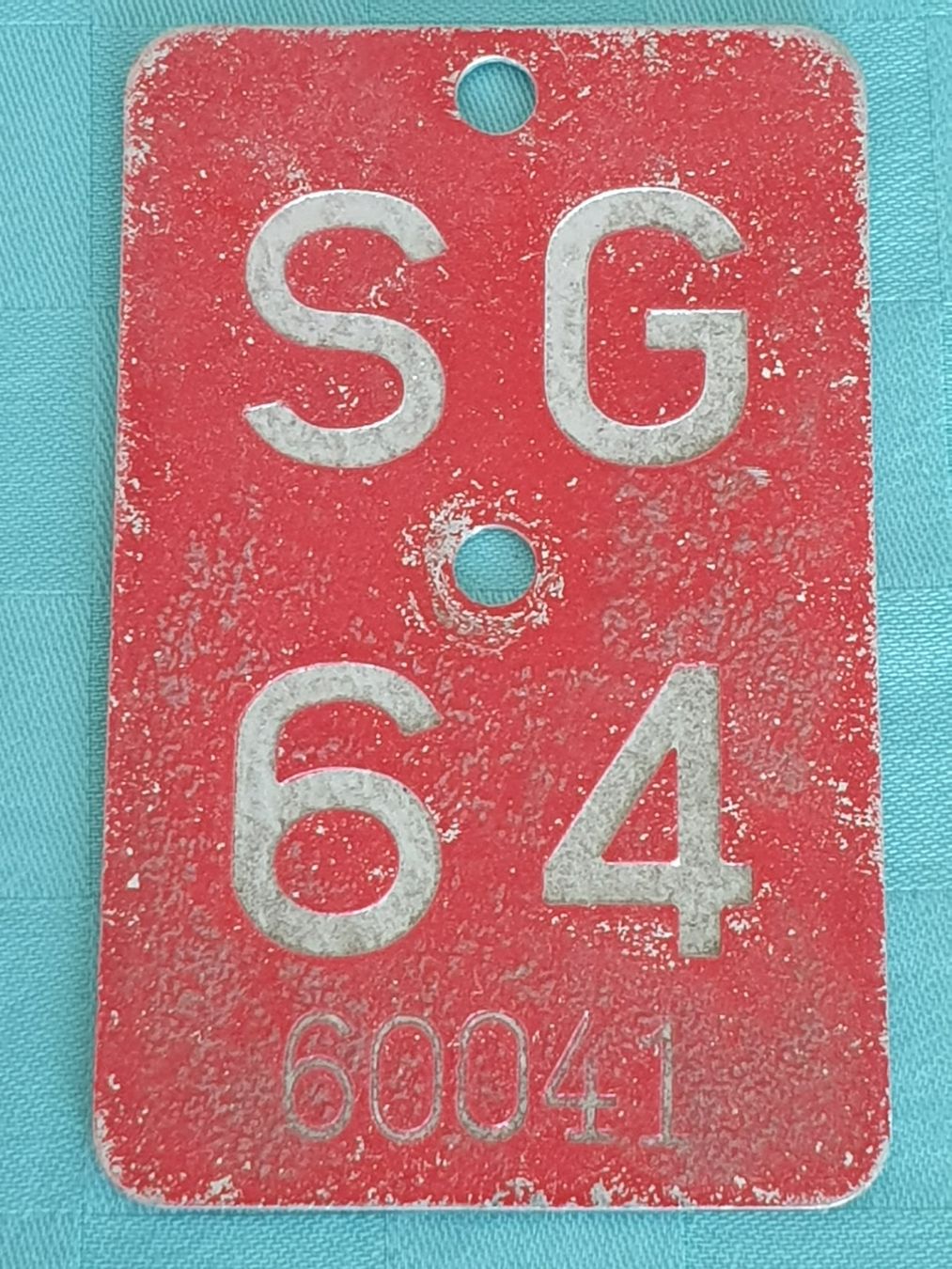 Insegne: Fahrradnummer Velonummer SG 64 – Usato da Mörschwil venduto da spirspi
