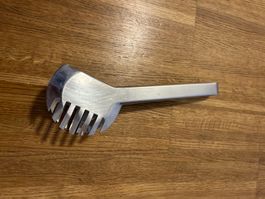 Praktische Küchenzange - Pince de cuisine pratique