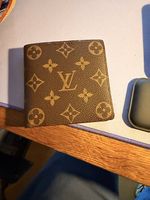 À vendre porte monnaie Louis Vuitton