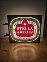 Stella Artois Leuchtschild – mit Wandhaltern, 76×88 cm