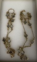 Orecchini ear cuff pendenti dorati. Mai usati