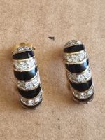 Elegante Ohrclips, schwarz/goldfarben 