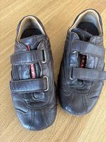 Prada Men’s Línea Rossa leather sneakers